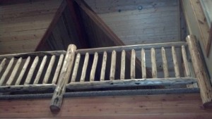Tenoned skip peeled interior log railing